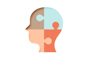 Vier Puzzleteile als Kopfform