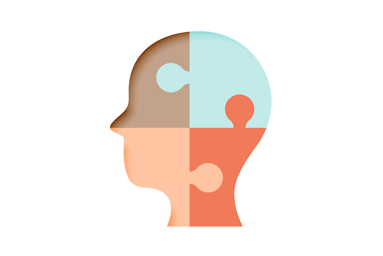 Vier Puzzleteile als Kopfform